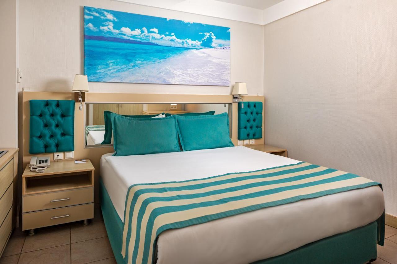 Aqi Hydros Club Hotel Kemer Exterior photo A bedroom at the Iberostar Grand Hotel Bávaro