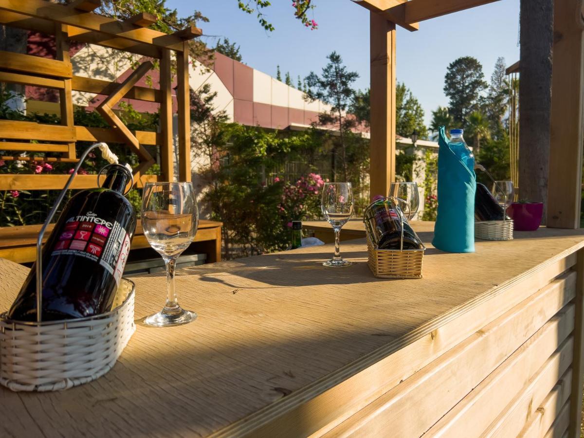 Aqi Hydros Club Hotel Kemer Exterior photo Wine tasting at the winery